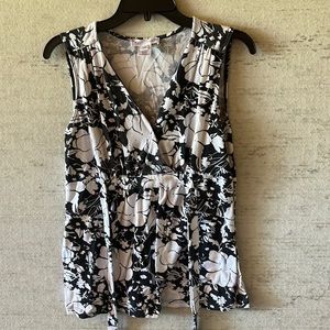 Sleeveless black and white top size L
